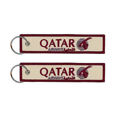 عمده فروشی Olecranon Hook ارزان سفارشی پارچه پرواز بروکاری برچسب جت کلید بند با لوگو خود